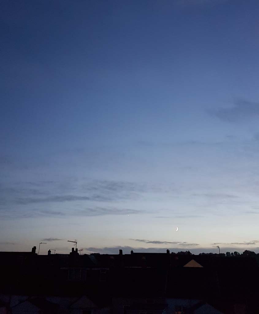 Photograph of Exeter rooftops in the evening. All rights reserved (www.hannahcatherinefoley.co.uk)