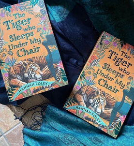 Copies of The Tiger Who Sleeps Under My Chair by Hannah Foley, published by Zephyr Books